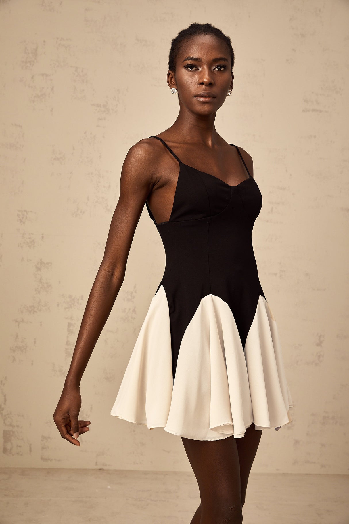 Aurohaya Justine color-blocked godet pleated mini dress