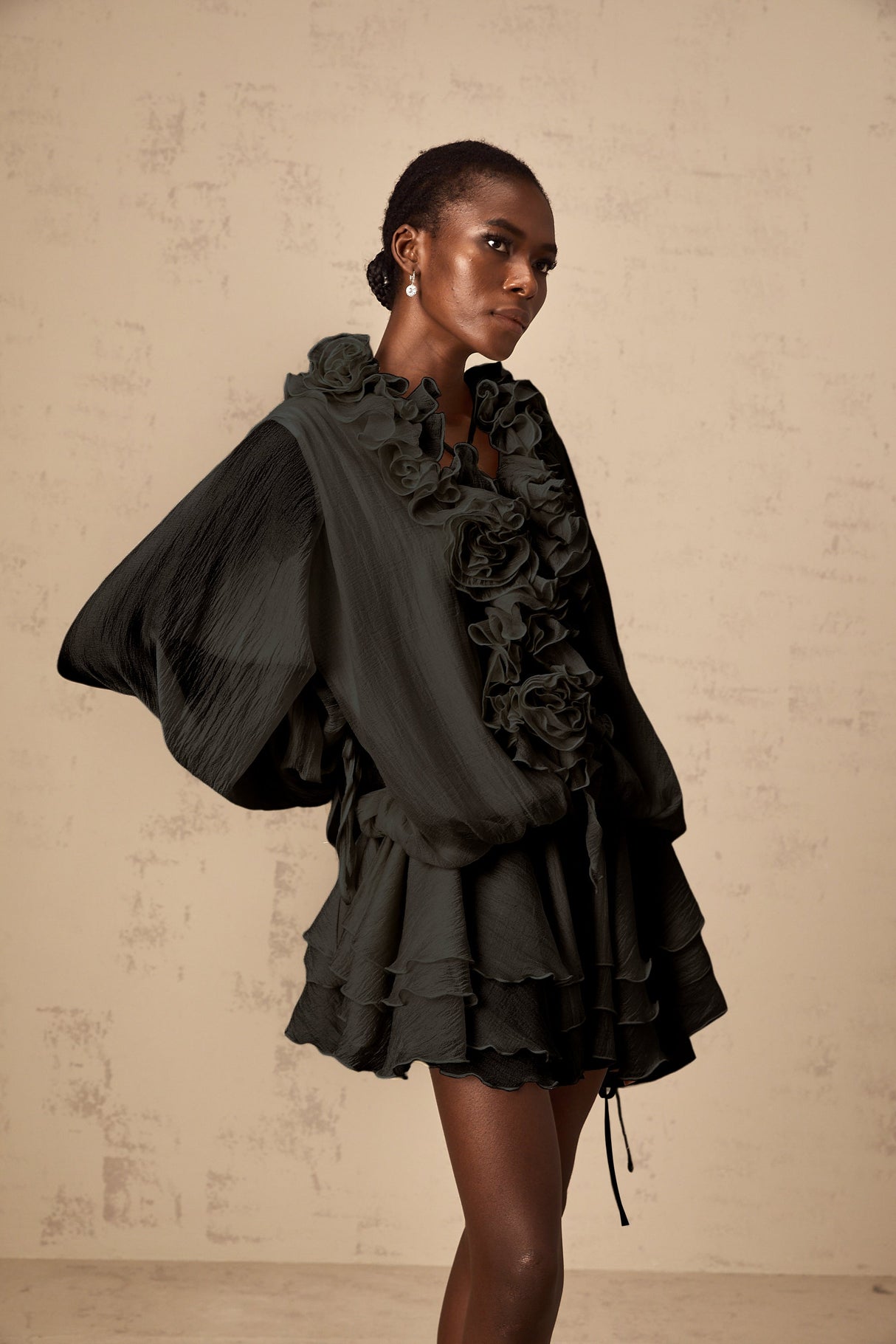 Aurohaya Zéphyrine floral-appliqué tiered mini dress in Black