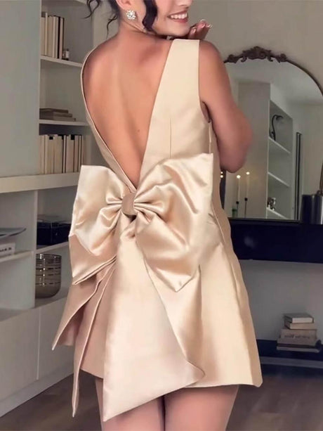 Aurohaya Modern Satin Backless Bow-Decorated High Waist Mini Dress Champagne