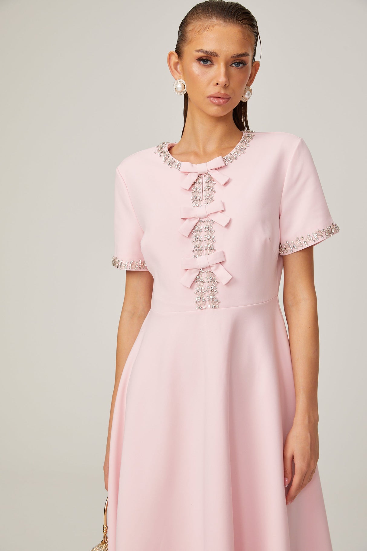 Aurohaya Cassi crystal-accented pink bow midi dress