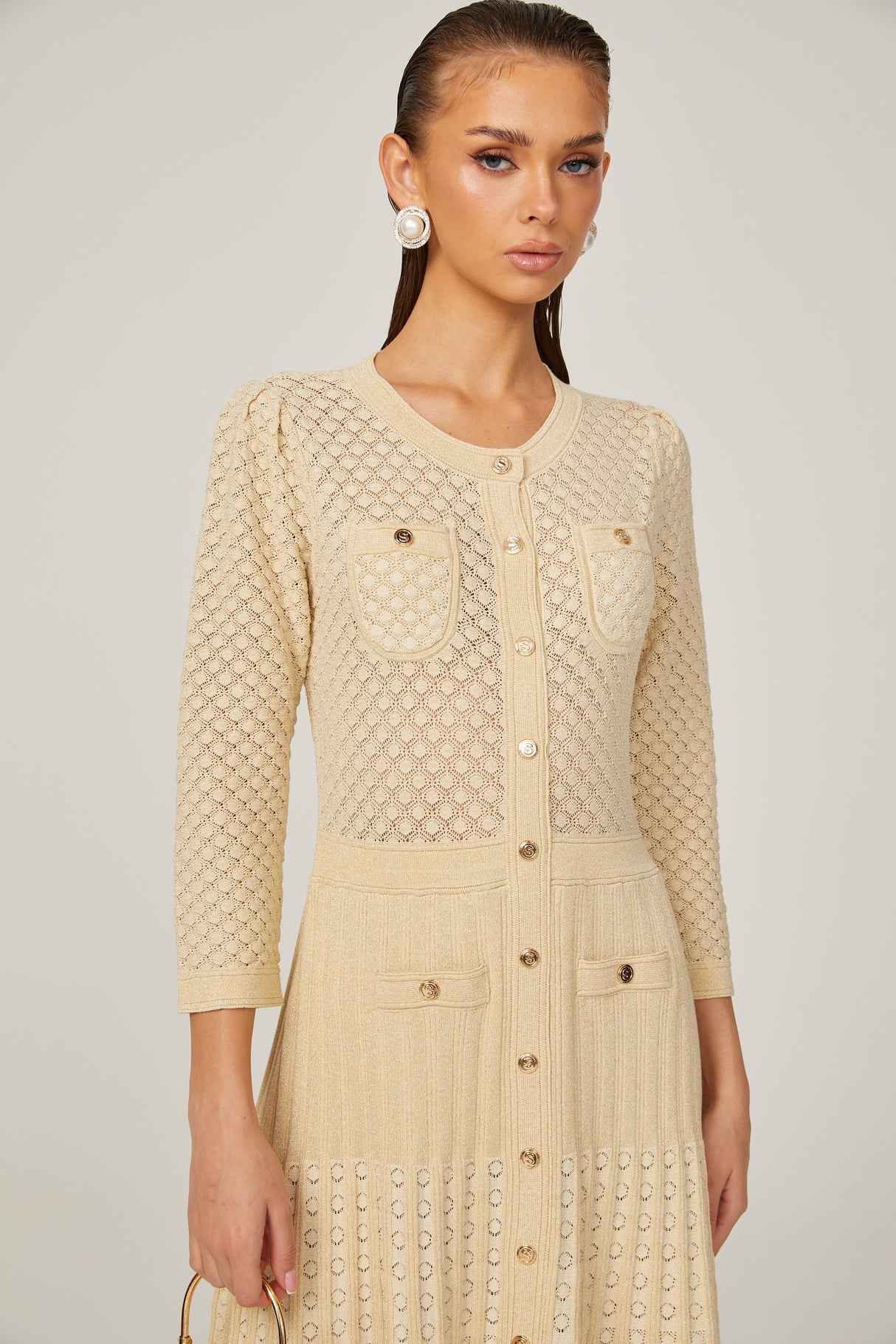 Aurohaya Élodie knitted long-sleeve midi dress in Neutrals