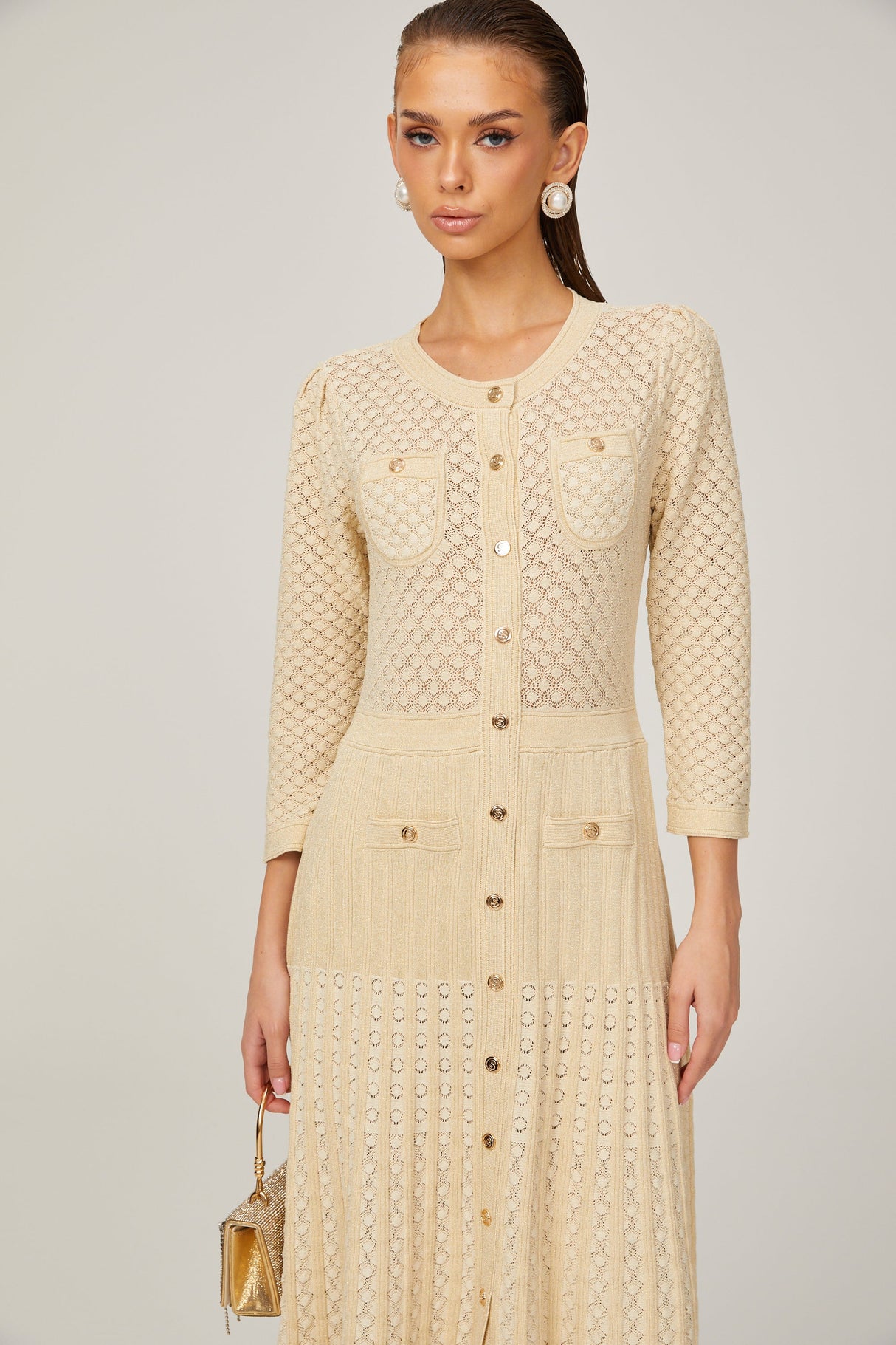 Aurohaya Élodie knitted long-sleeve midi dress in Neutrals
