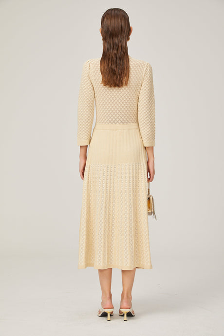 Aurohaya Élodie knitted long-sleeve midi dress in Neutrals