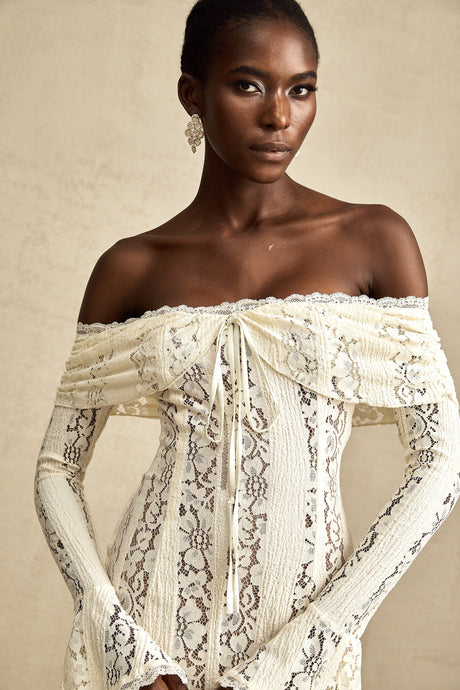 Aurohaya Émeline floral lace flared-cuff mini dress in Neutrals
