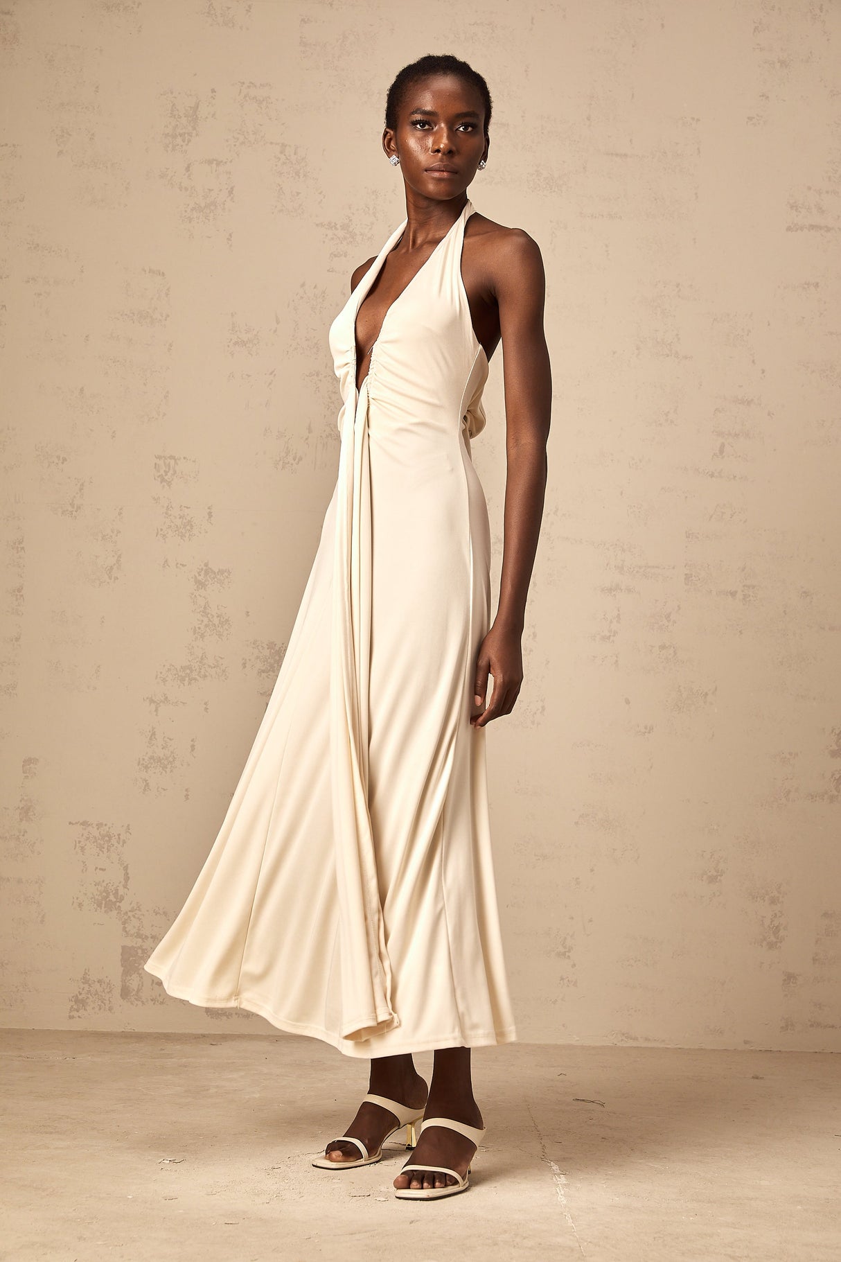 Aurohaya Géraldine white deep V-neck draped maxi dress