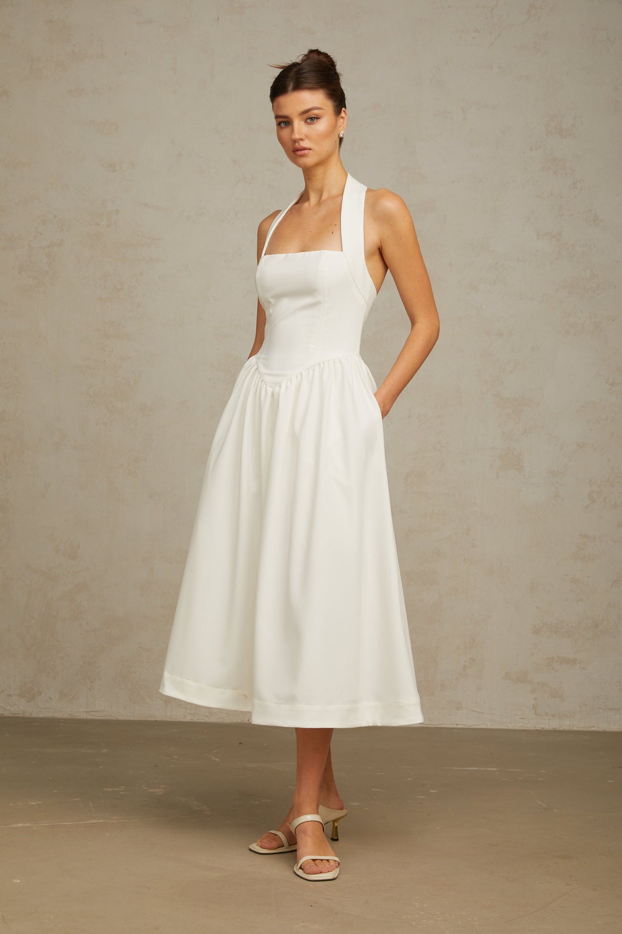 Aurohaya Alizée halterneck pleated midi dress in White