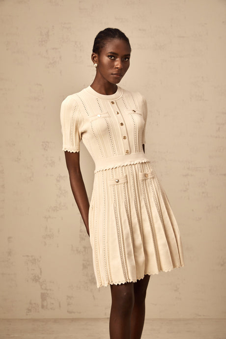 Aurohaya Amélie neutrals pointelle-trim pleated knit mini dress