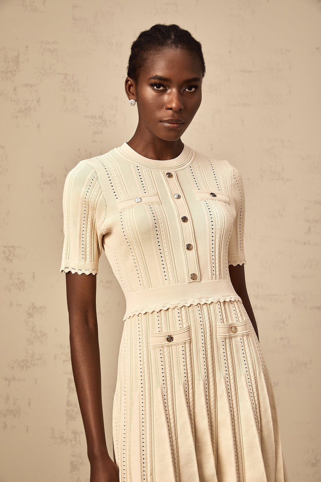 Aurohaya Amélie neutrals pointelle-trim pleated knit mini dress