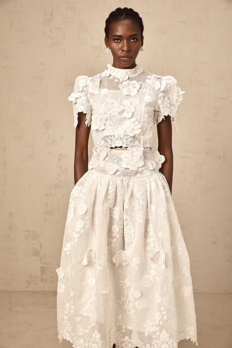 Aurohaya Thérèse white flower-embroidered top & skirt matching set