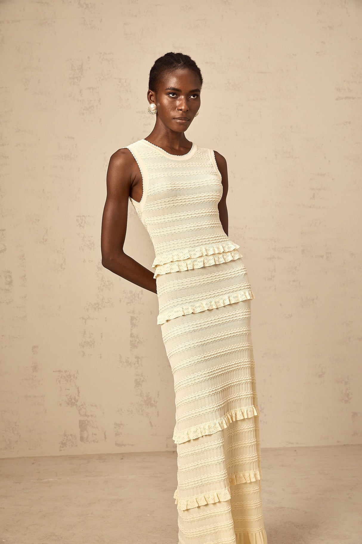 Aurohaya Airelle beige ruffled sleeveless knit maxi dress