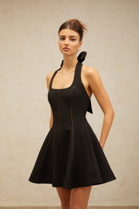 Aurohaya Quirine halterneck bow-detail mini dress in Black