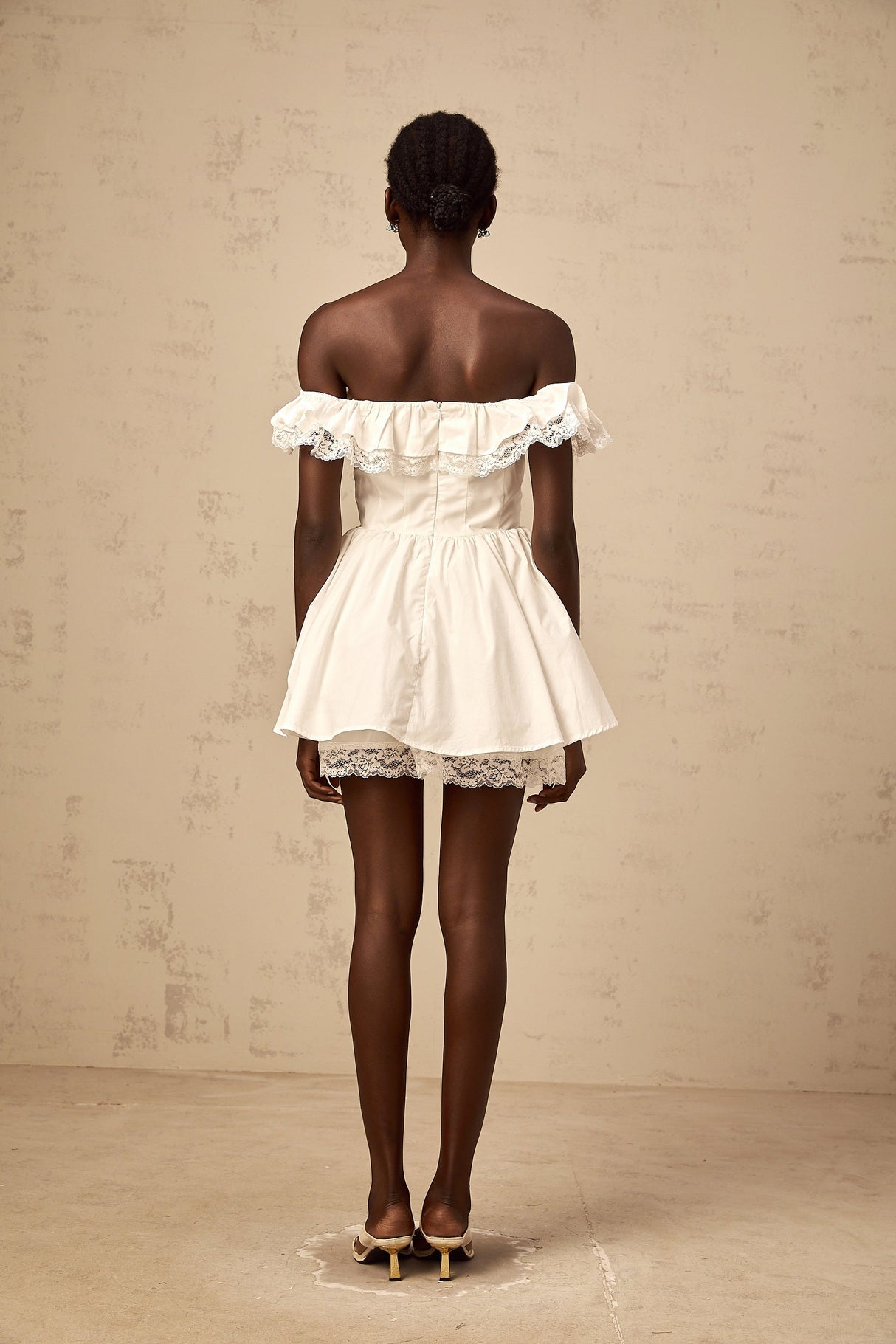 Aurohaya Arsène white oversize-bow ruffled mini dress