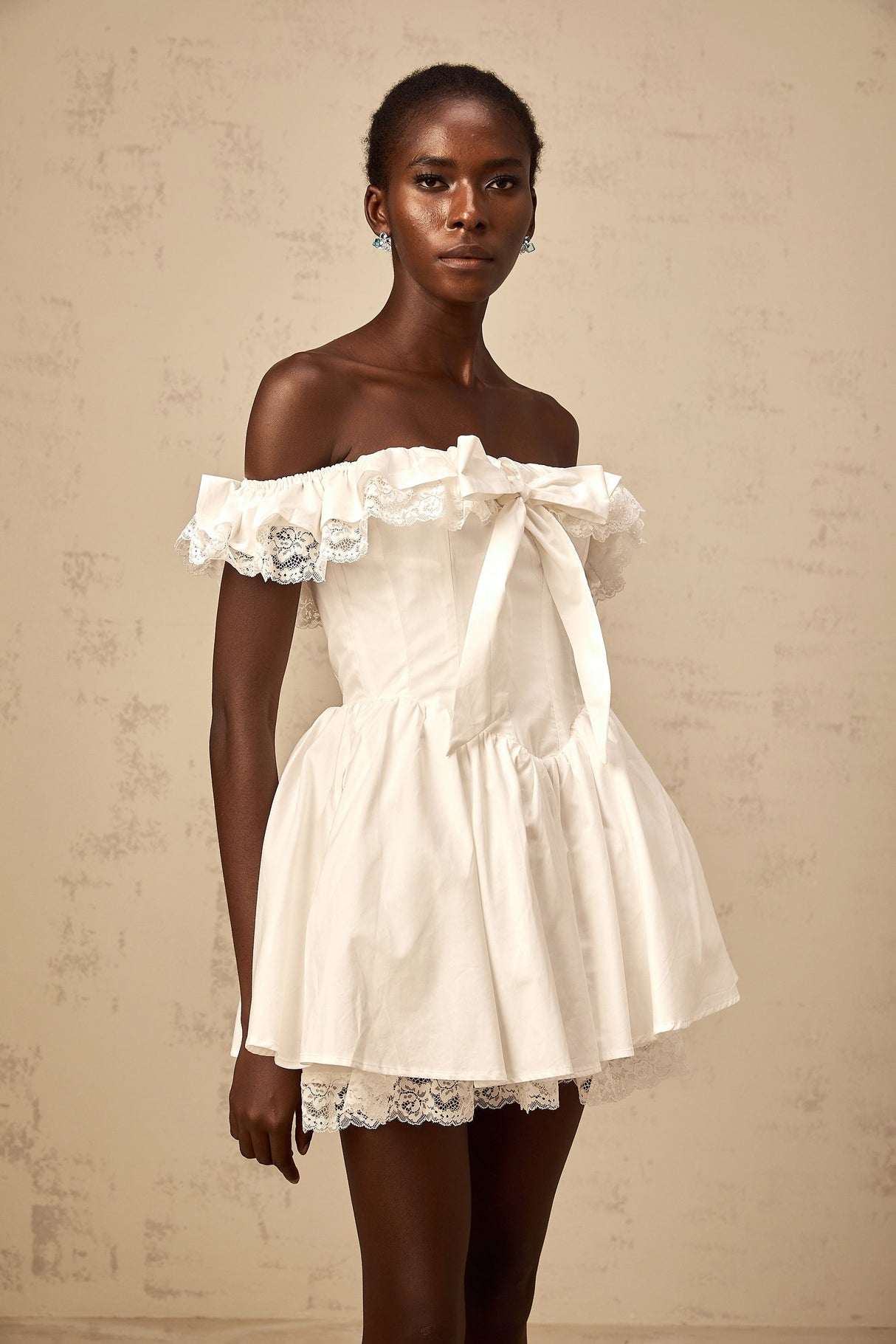 Aurohaya Arsène white oversize-bow ruffled mini dress