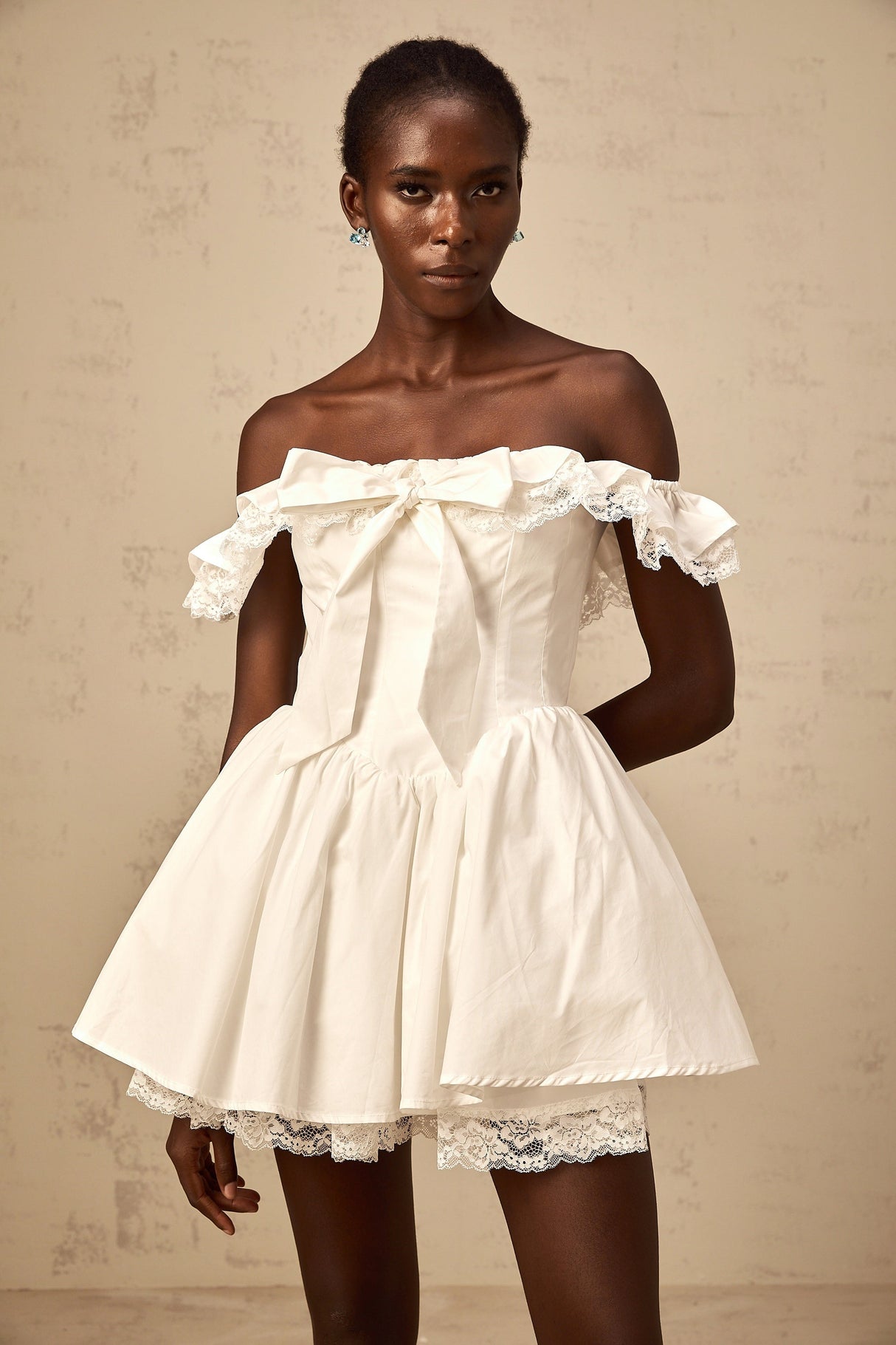 Aurohaya Arsène white oversize-bow ruffled mini dress