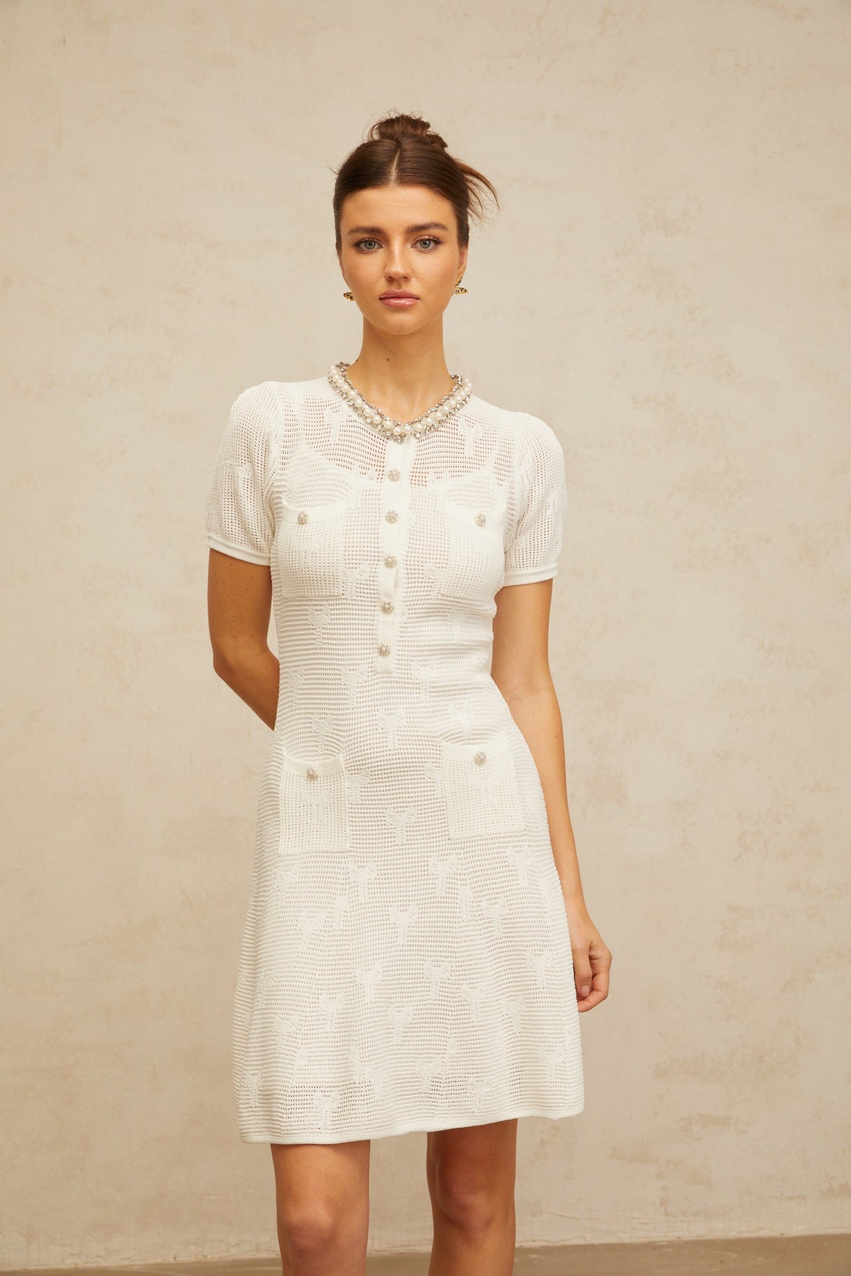 Aurohaya Marjolaine white embellished crochet-knit mini dress