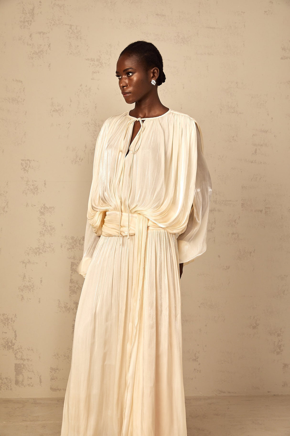 Aurohaya Eugénie Pleated Ruffle Maxi Dress in Neutral
