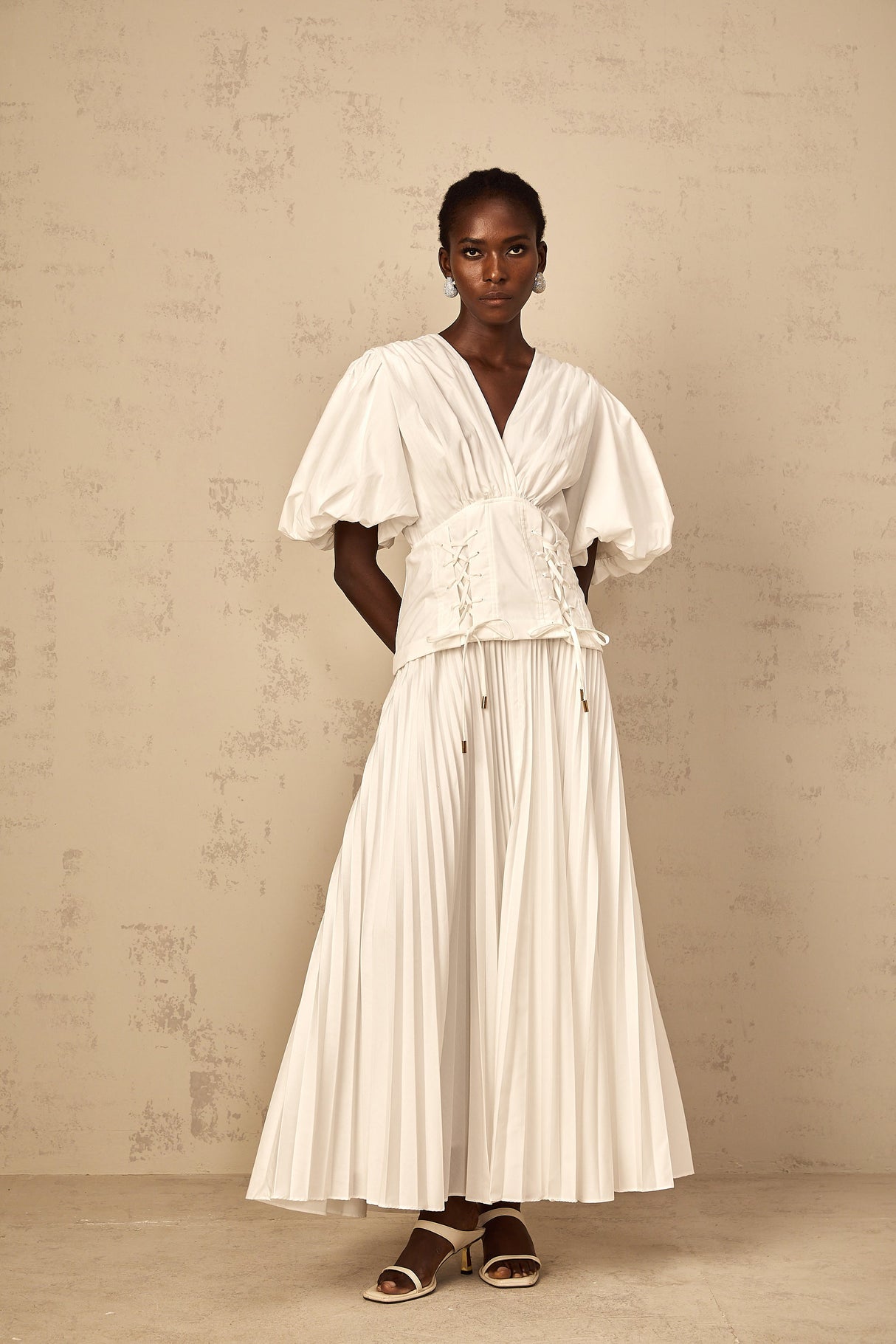 Aurohaya Vienne White Lace-Up Pleated Maxi Dress