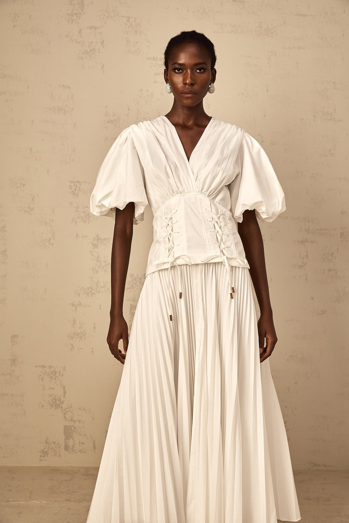 Aurohaya Vienne White Lace-Up Pleated Maxi Dress
