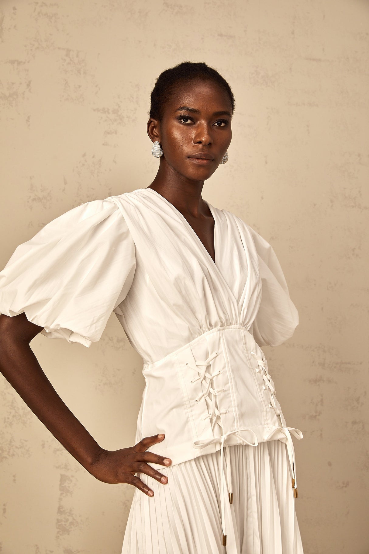 Aurohaya Vienne White Lace-Up Pleated Maxi Dress