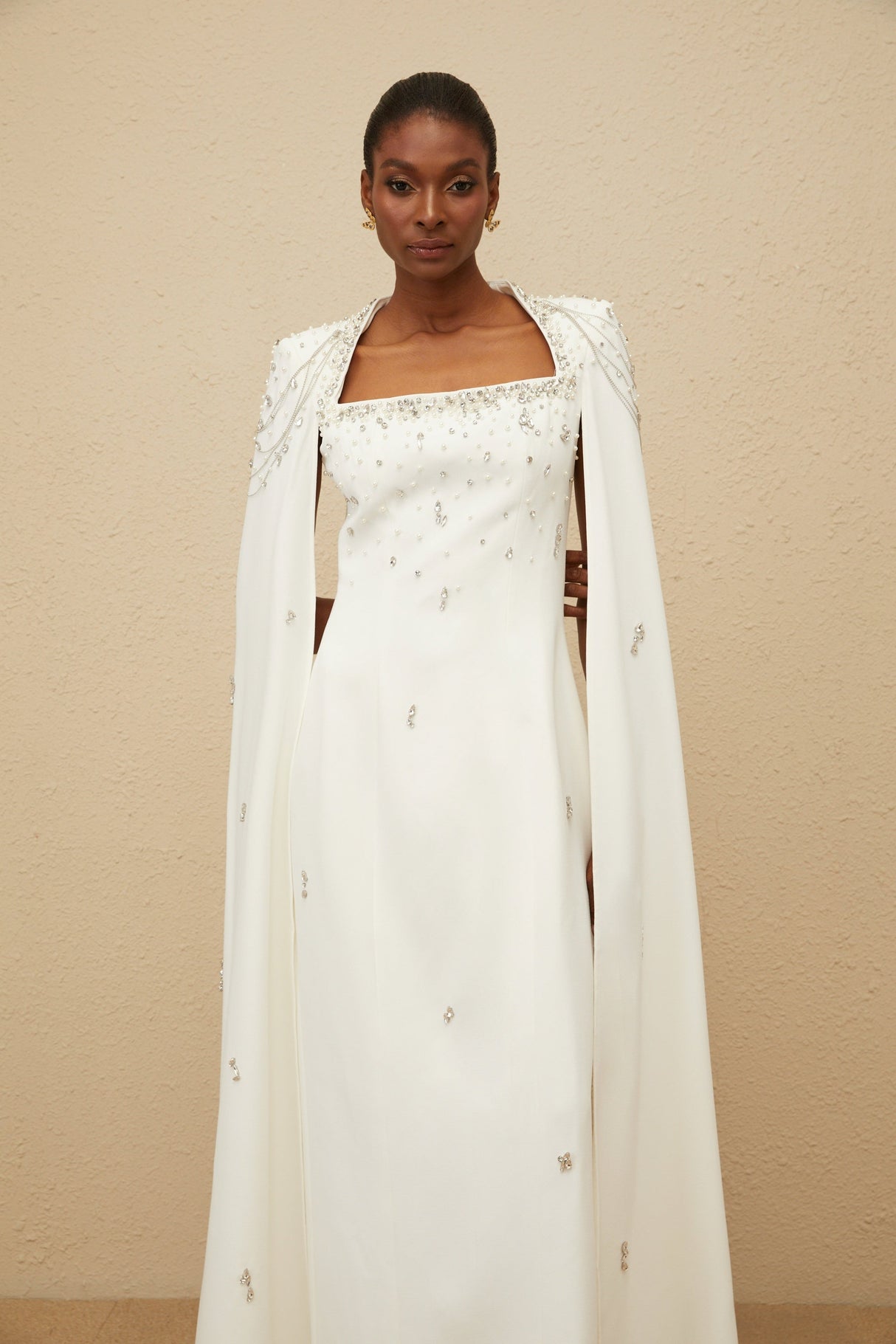 Aurohaya Épuré White Embellished Cape Gown