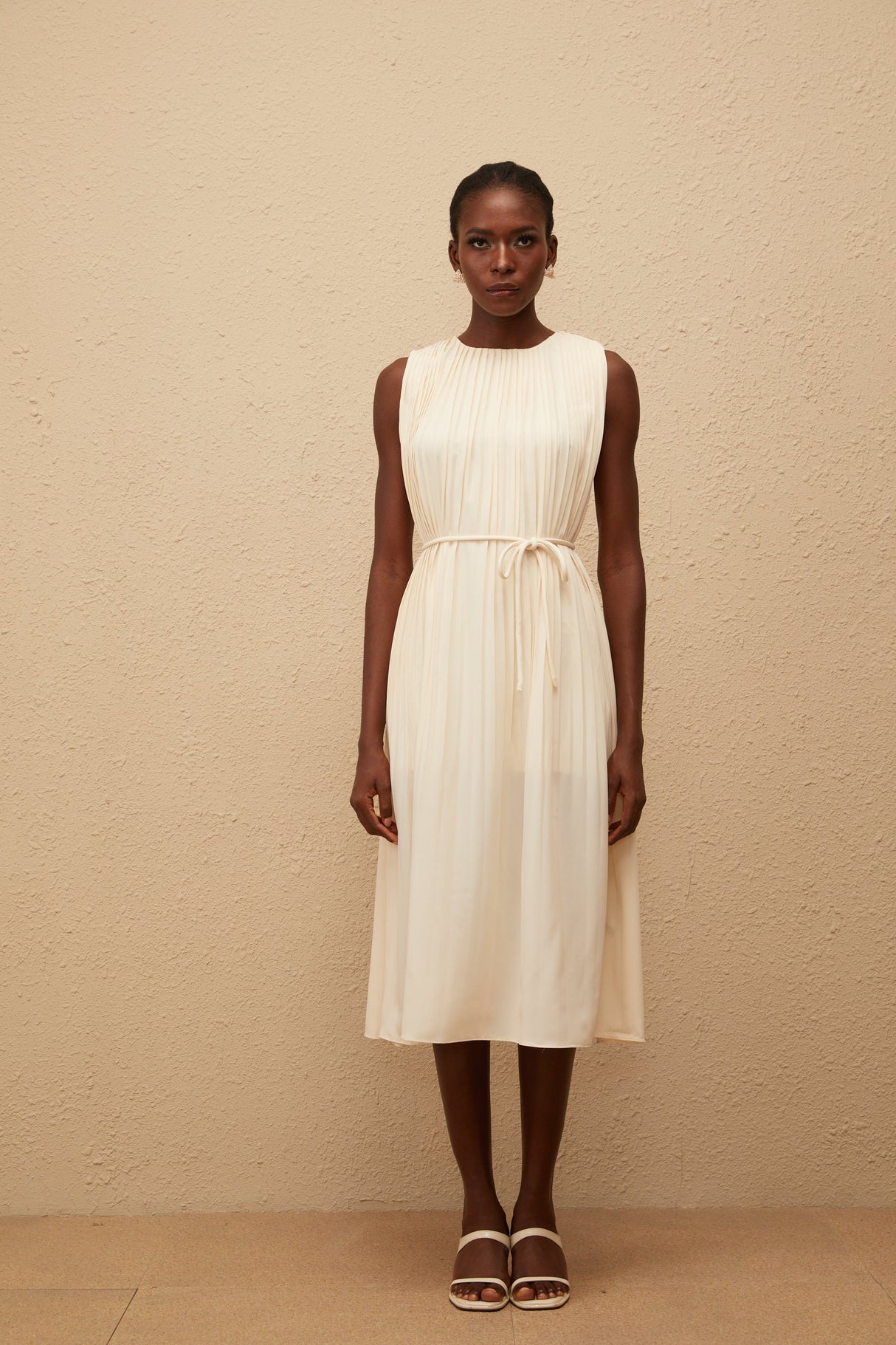 Aurohaya Célestine Neutral Sleeveless Pleated Midi Dress