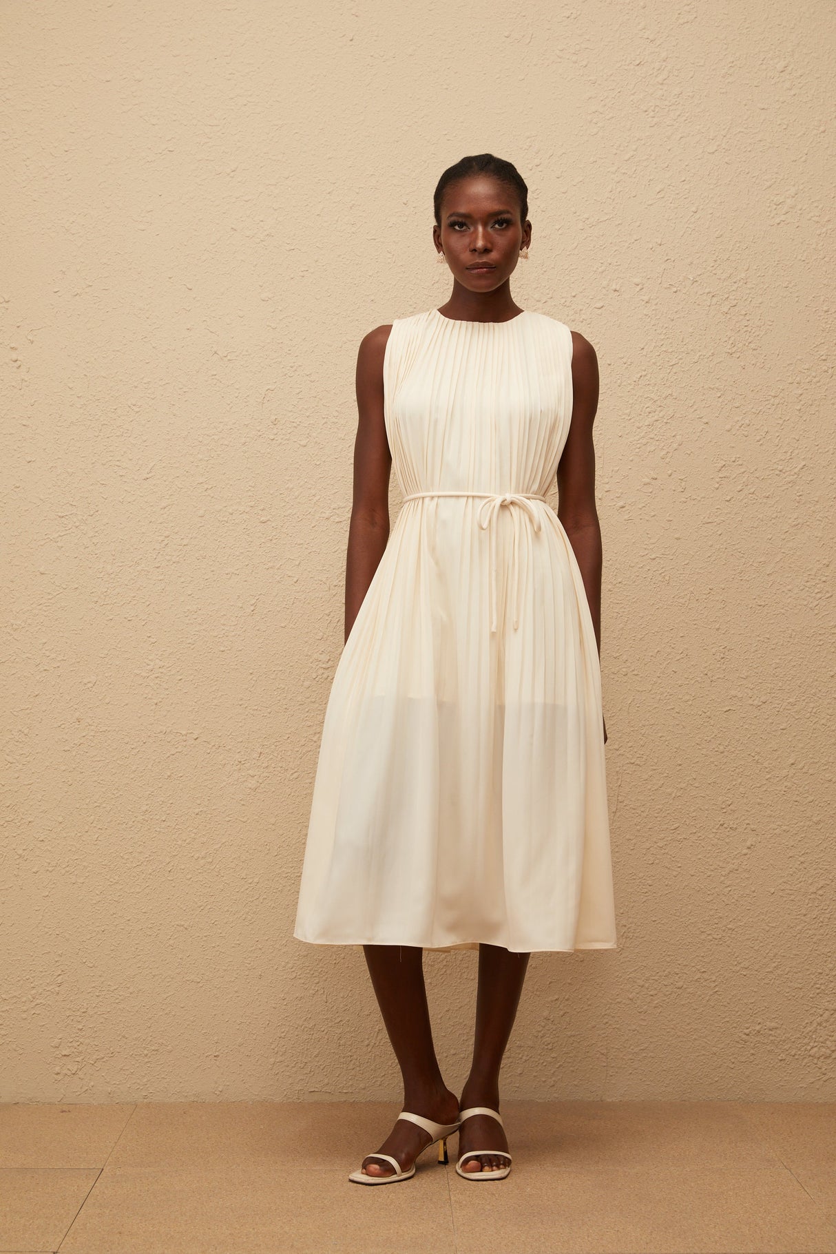 Aurohaya Célestine Neutral Sleeveless Pleated Midi Dress