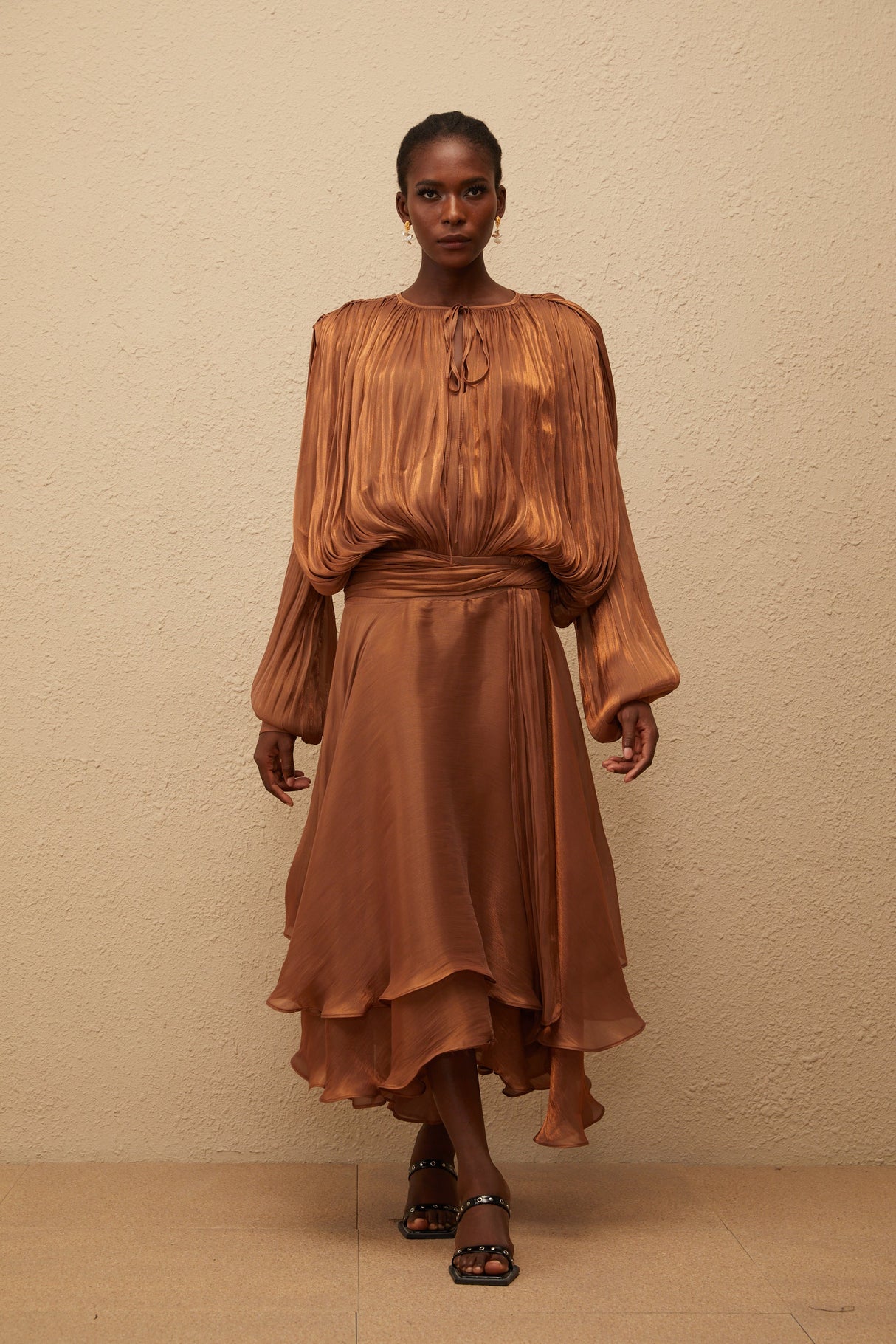 Aurohaya Eugénie Pleated Ruffle Maxi Dress in Brown