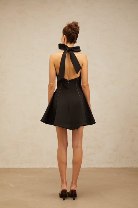 Aurohaya Quirine halterneck bow-detail mini dress in Black