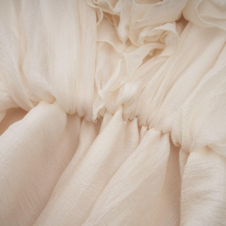 Aurohaya Léonie floral-appliqué tiered mini dress in Neutrals