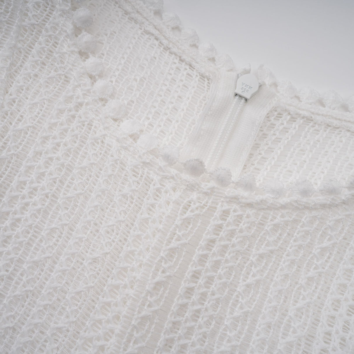 Aurohaya Hélène white pointelle puff midi dress