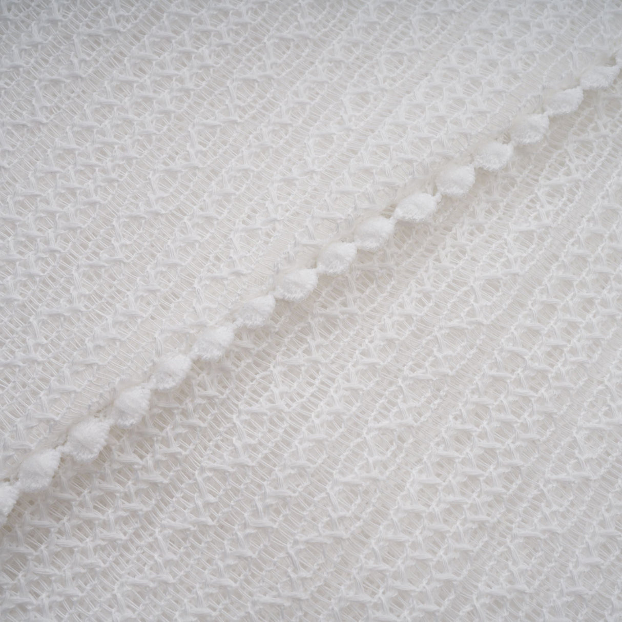 Aurohaya Hélène white pointelle puff midi dress