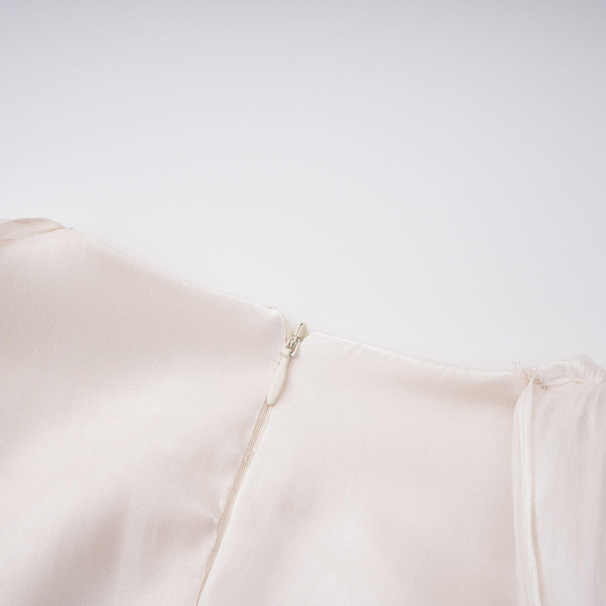 Aurohaya Hege Cream Glossy Ruched Cape Maxi Dress