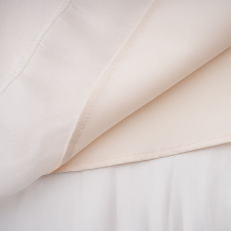 Aurohaya Hege Cream Glossy Ruched Cape Maxi Dress