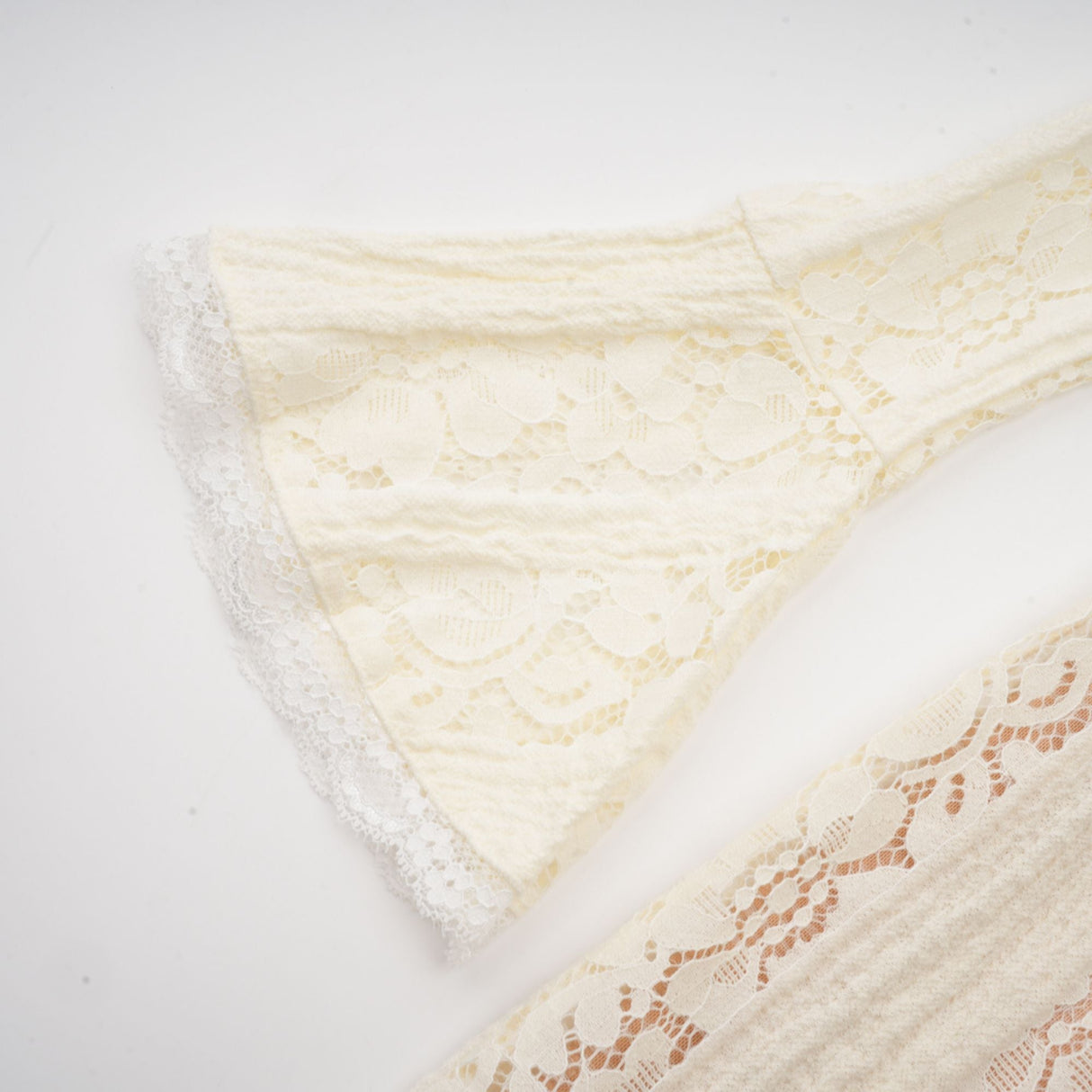 Aurohaya Émeline floral lace flared-cuff mini dress in Neutrals