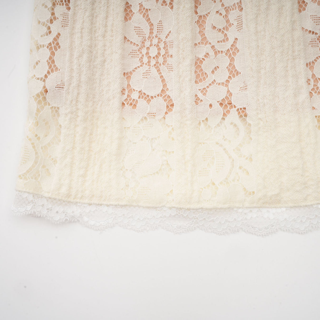 Aurohaya Émeline floral lace flared-cuff mini dress in Neutrals