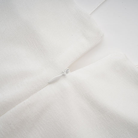 Aurohaya Noémie off-shoulder panelled maxi dress in White