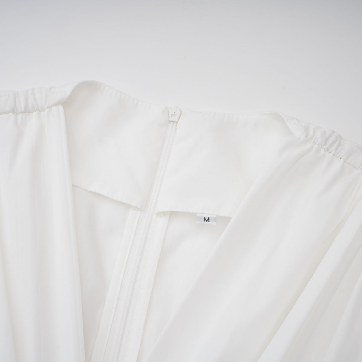 Aurohaya Vienne White Lace-Up Pleated Maxi Dress