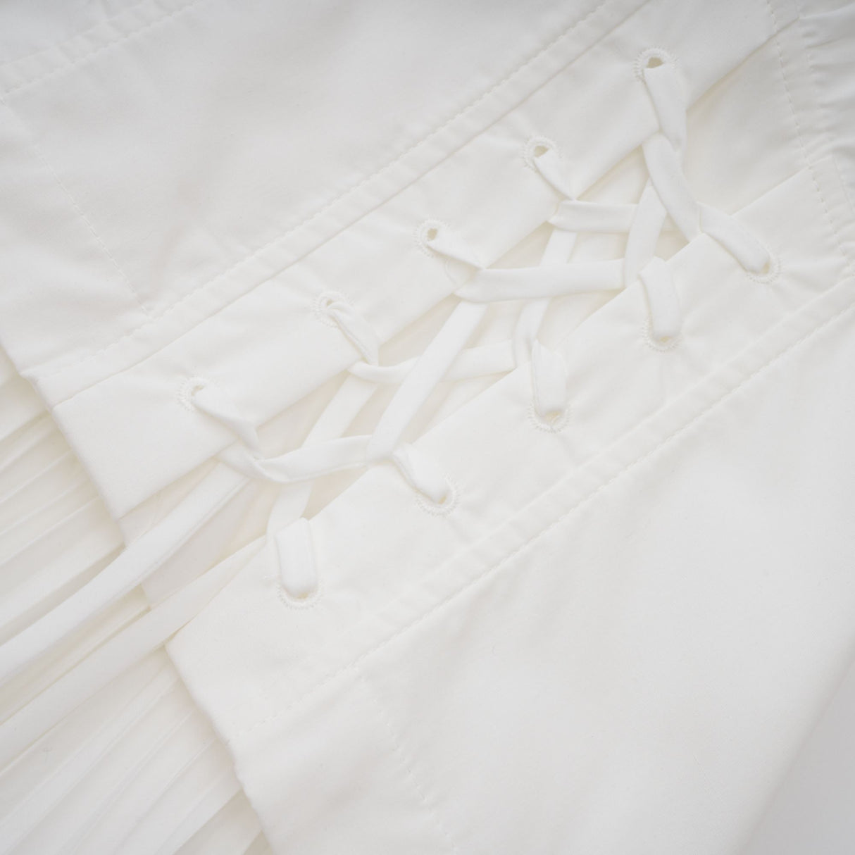 Aurohaya Vienne White Lace-Up Pleated Maxi Dress
