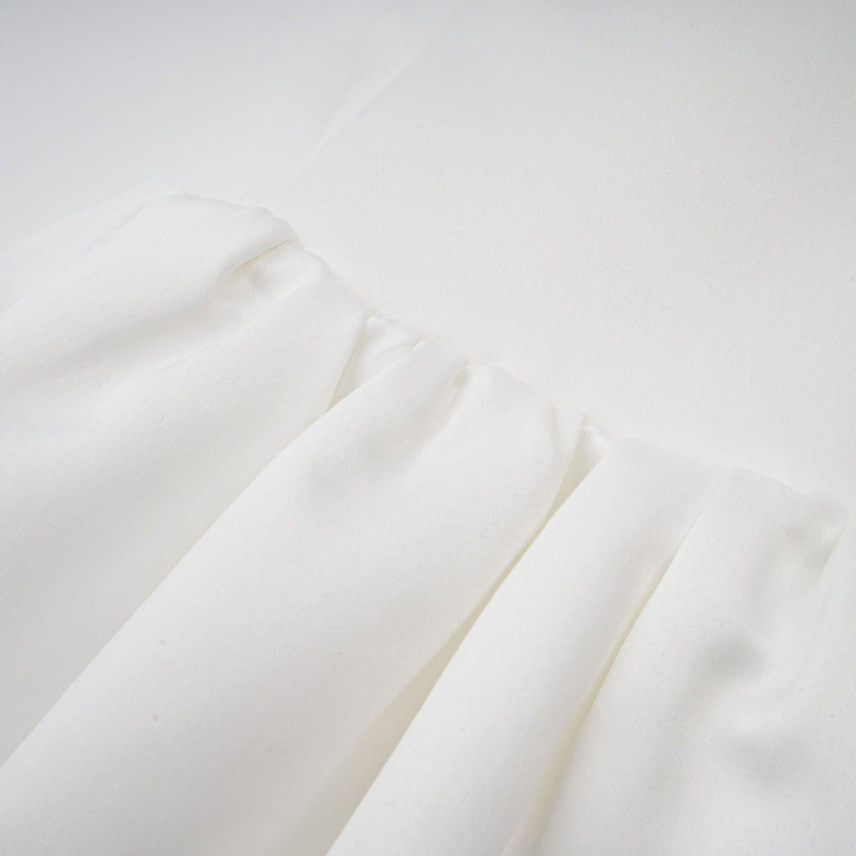 Aurohaya Aurélie white halterneck ruffled mini dress