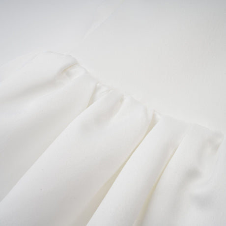 Aurohaya Aurélie white halterneck ruffled mini dress