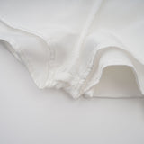 Aurélie white halterneck ruffled mini dress