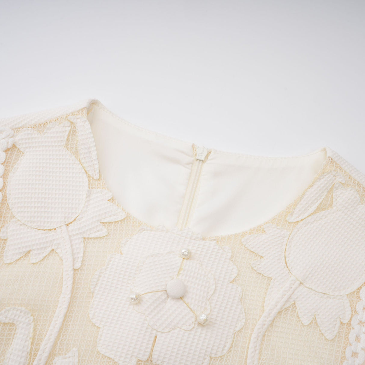 Aurohaya Maelle white flower-embroidered mini dress