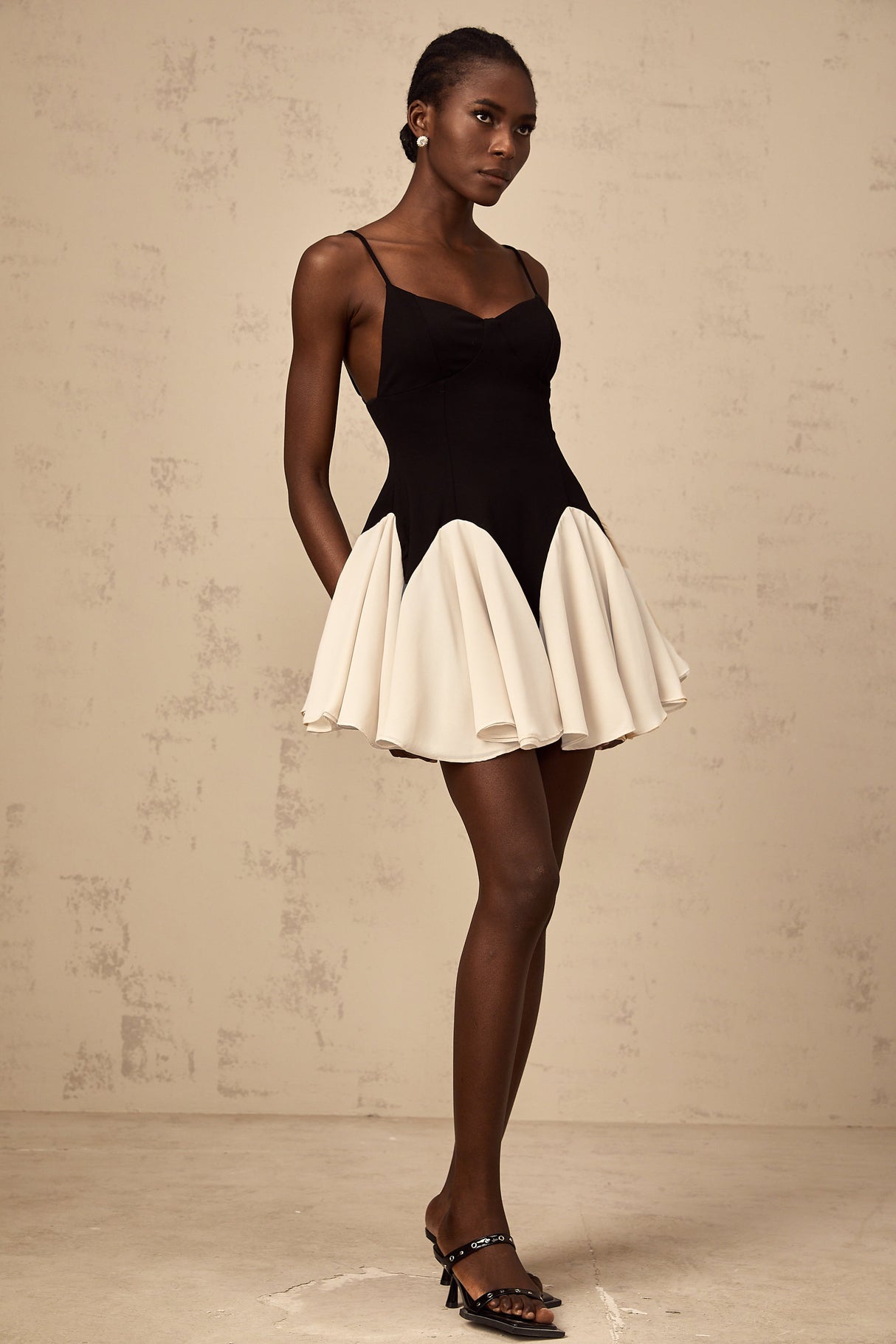 Aurohaya Justine color-blocked godet pleated mini dress
