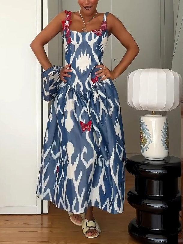 Aurohaya Elegant Ikat Print Sleeveless Butterfly Embellished Maxi Dress
