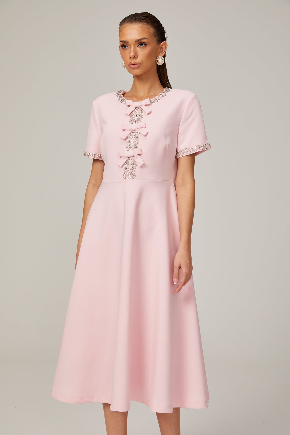Aurohaya Cassi crystal-accented pink bow midi dress
