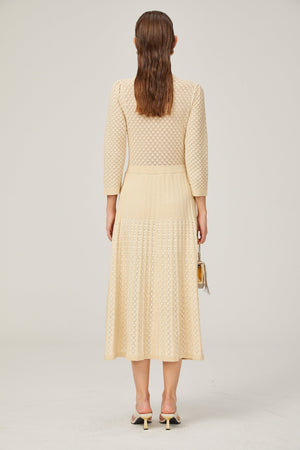 Aurohaya Élodie knitted long-sleeve midi dress in Neutrals