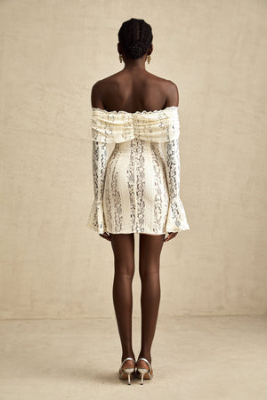 Aurohaya Émeline floral lace flared-cuff mini dress in Neutrals