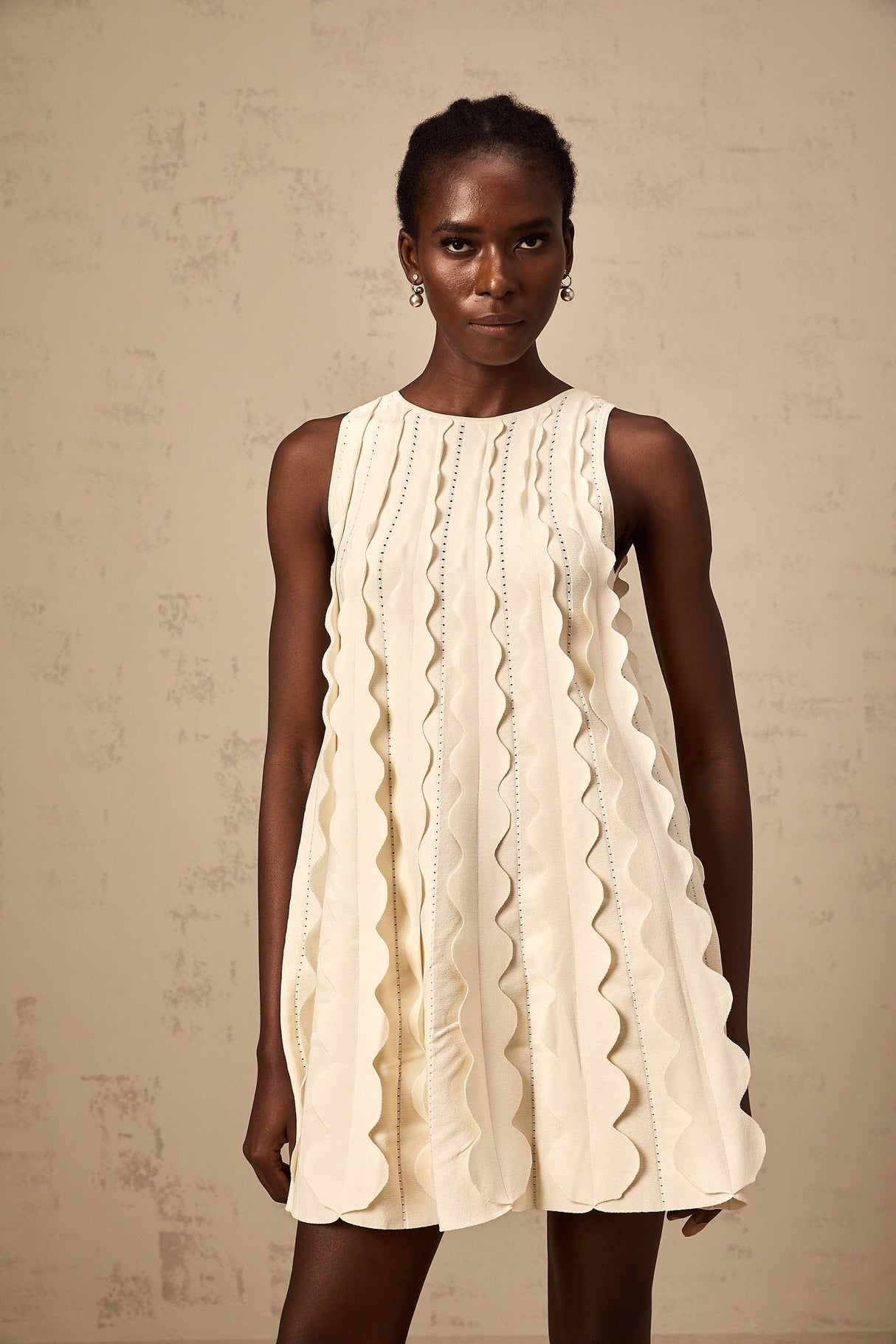 Aurohaya Axelle white wavy-detail sleeveless mini dress
