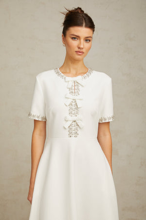 Aurohaya Cassiopeia crystal-accented bow midi dress in White