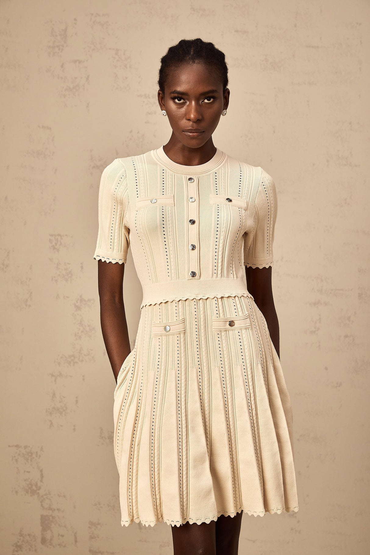 Aurohaya Amélie neutrals pointelle-trim pleated knit mini dress